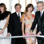 France’s LVMH Moet Hennessy Louis Vuitton President and Chairman Arnault cuts a ribbon to mark the …